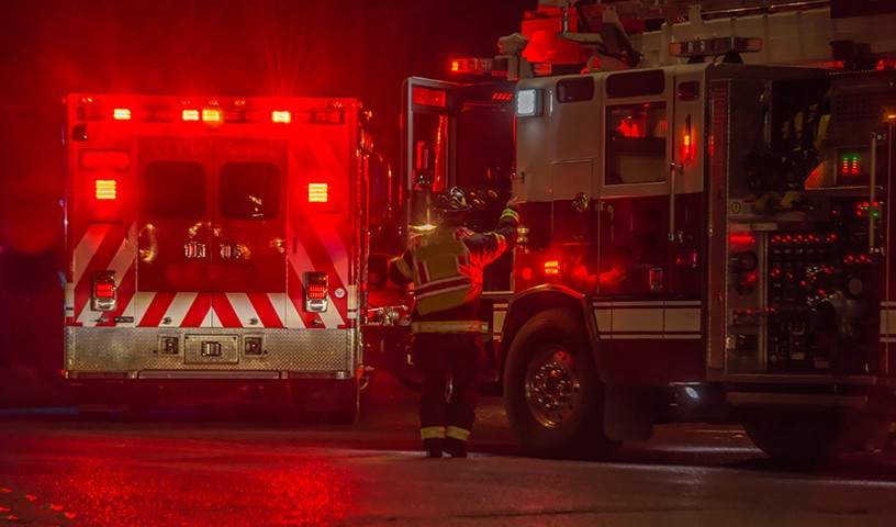 fire truck, firefighter, ambulance responding to car crash at night