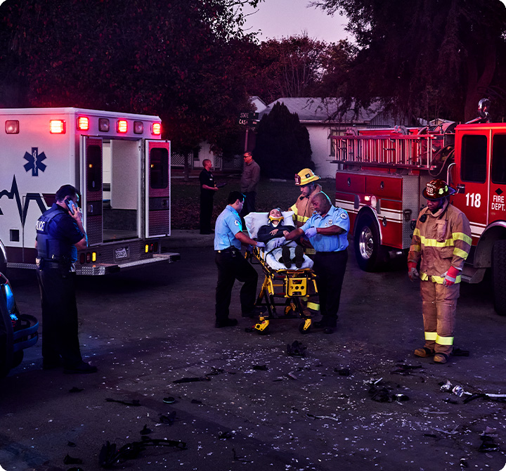 First responders assisting patient on scene