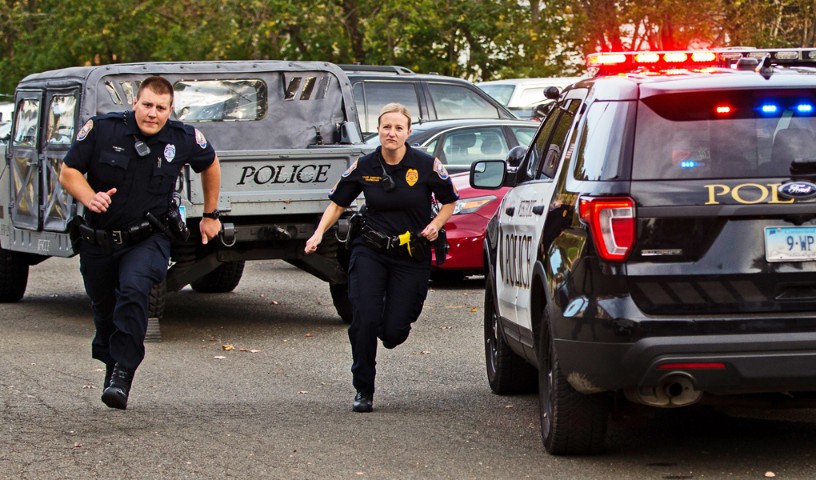 FirstNet responders gather around computer screens in office near the Alamo in San Antonio, Texas